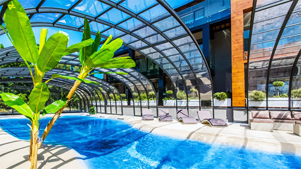 Hohe Poolüberdachung Aluna® Opera