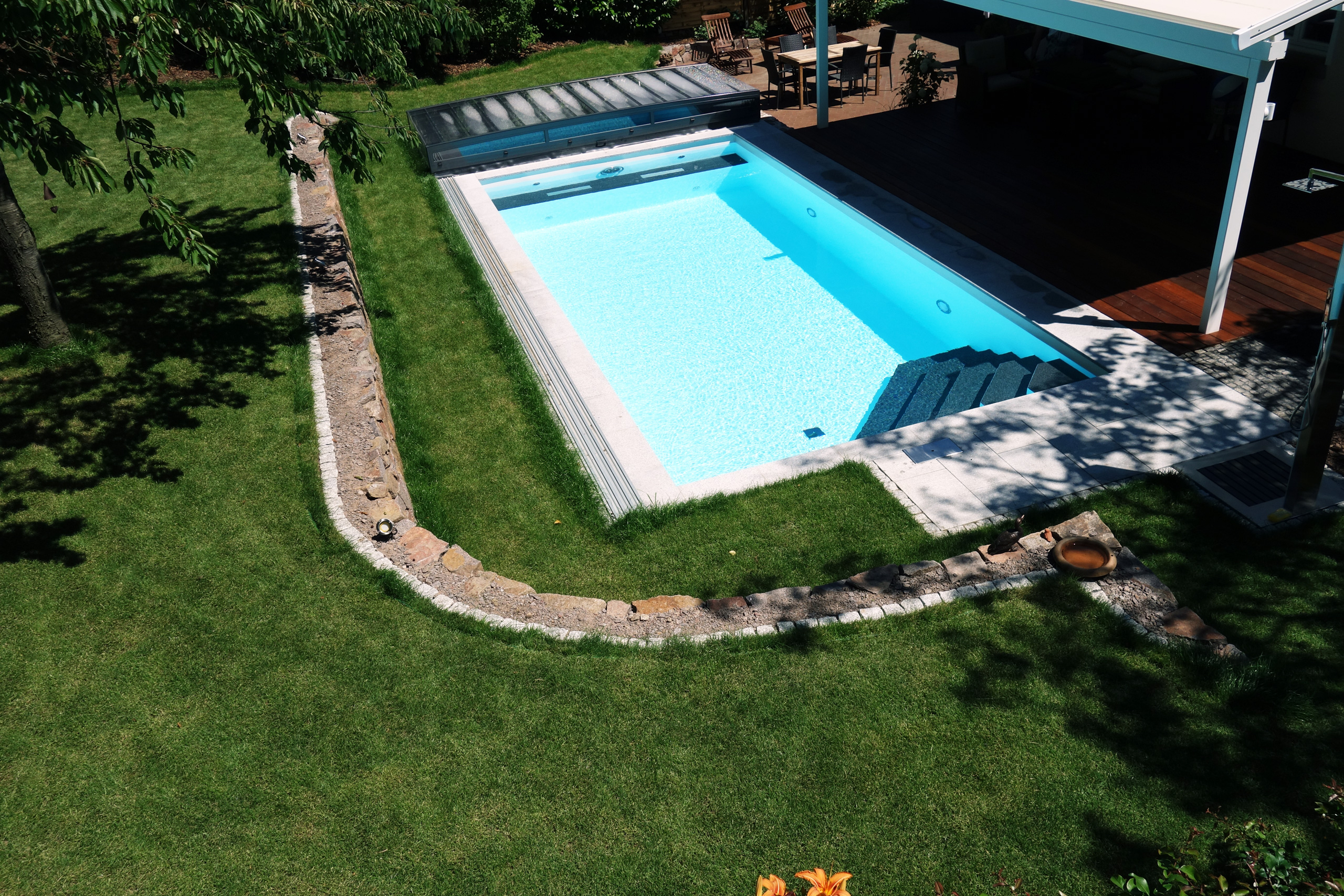 Rechteckpool 3,5x7x1,5m mit Ecktreppe und Aquacomet Horizont Überdachung