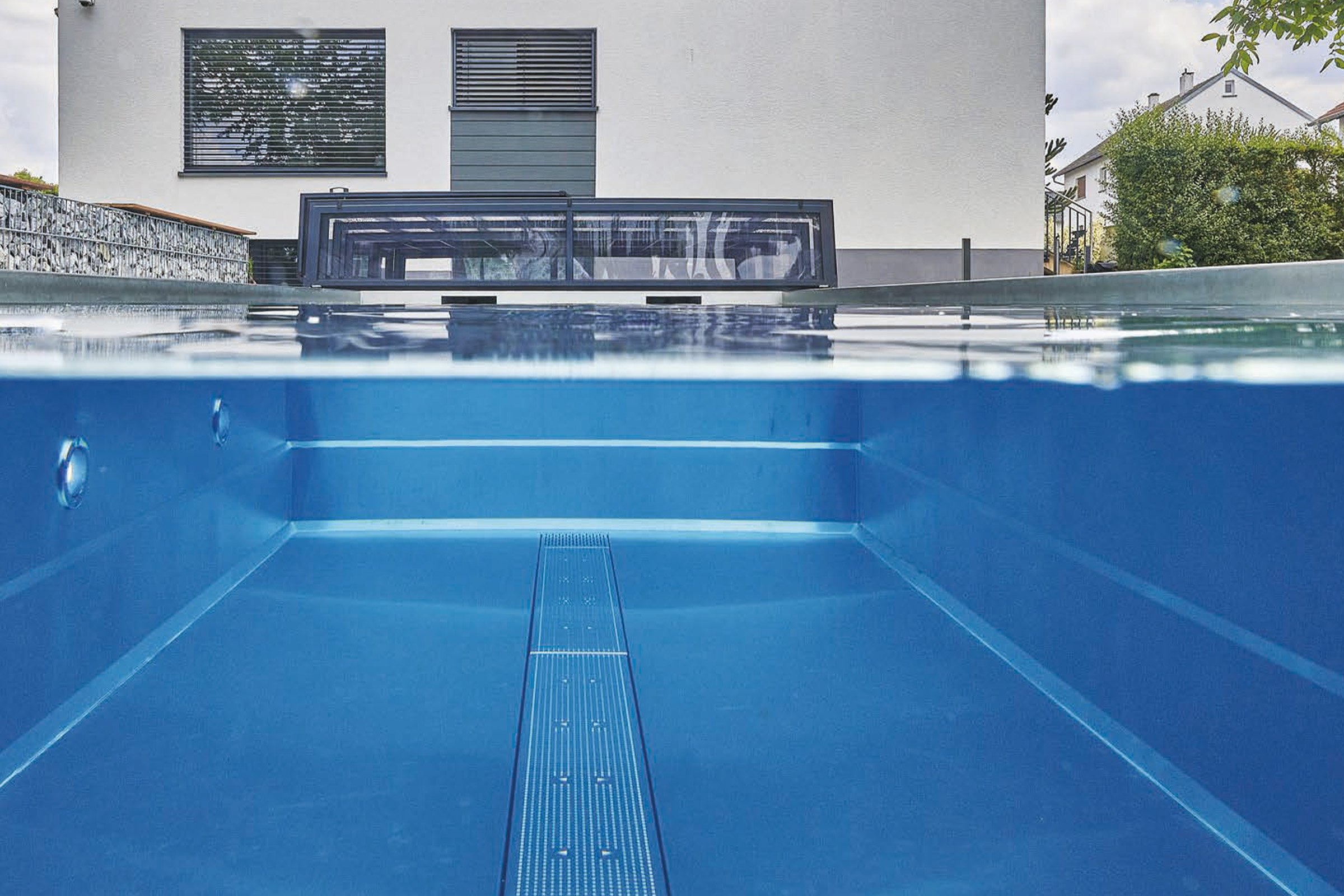 Edelstahlschwimmbecken Skimmerpool mit Poolüberdachung